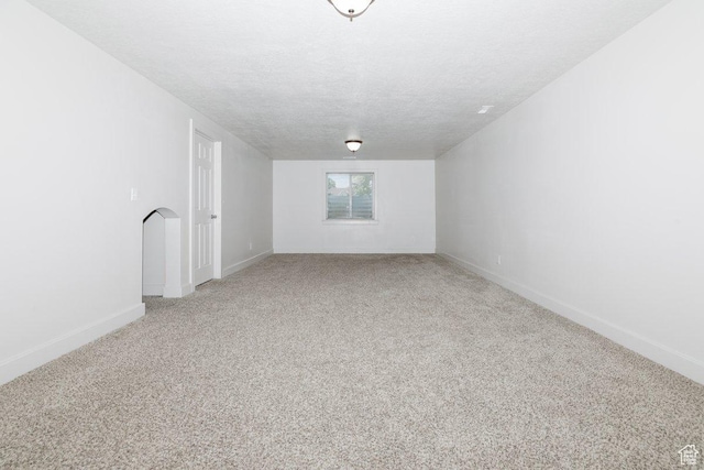 287 S 375 W, Providence, UT 84332 - spare room with light colored carpet and a textured ceiling