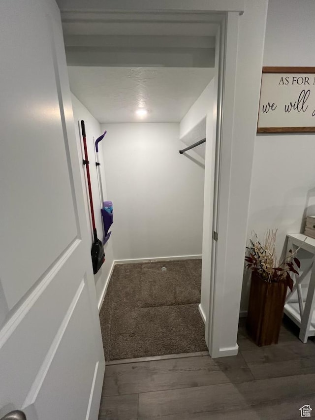 205 E Serenity Ave Unit 1213, Tooele, UT 84074 - corridor featuring wood finished floors and baseboards