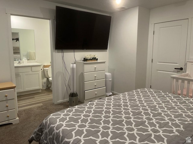 205 E Serenity Ave Unit 1213, Tooele, UT 84074 - carpeted bedroom with a sink and ensuite bathroom