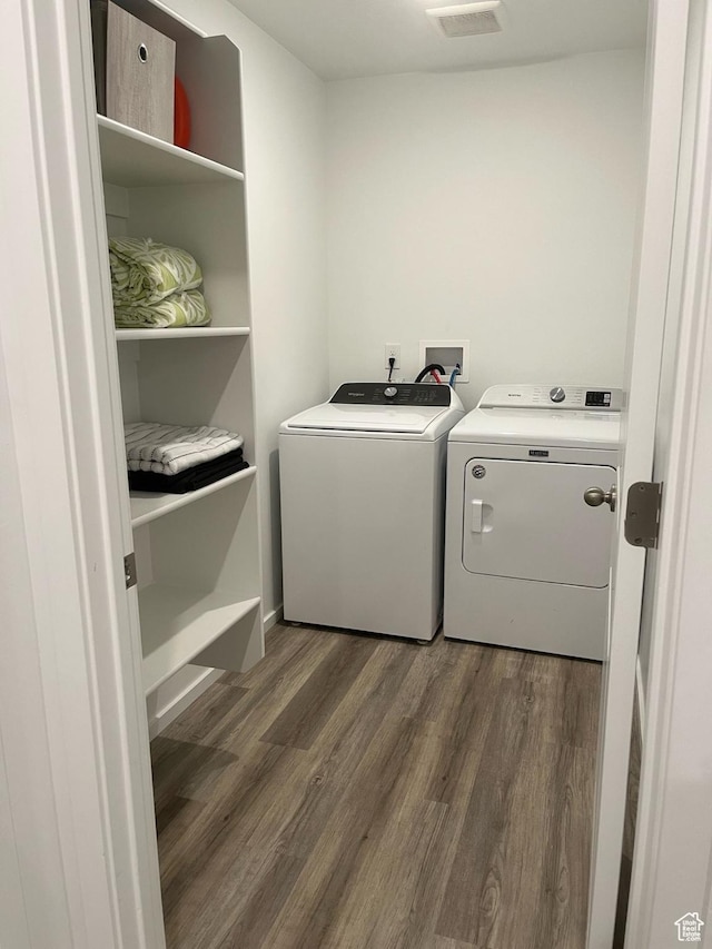 205 E Serenity Ave Unit 1213, Tooele, UT 84074 - laundry room featuring washer and clothes dryer and dark wood-type flooring