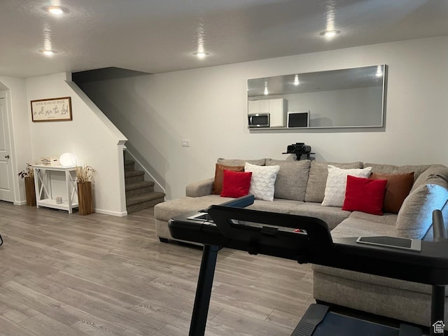 205 E Serenity Ave Unit 1213, Tooele, UT 84074 - living area with wood finished floors and stairs