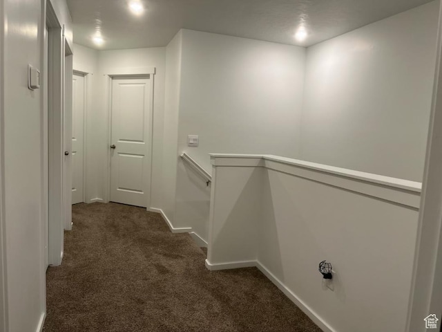 205 E Serenity Ave Unit 1213, Tooele, UT 84074 - corridor featuring dark carpet and baseboards