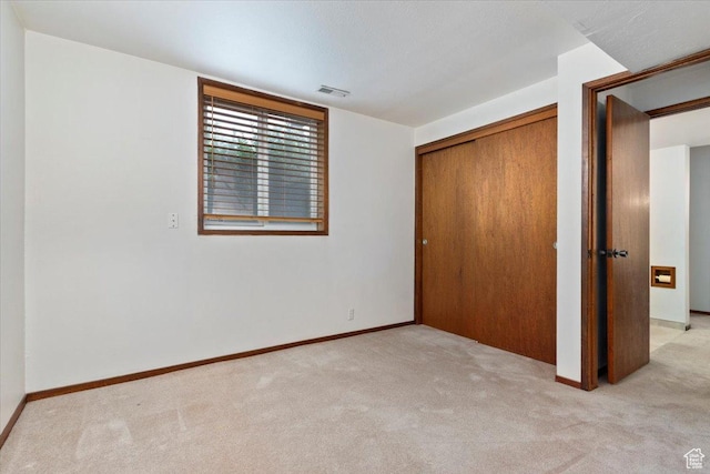 4153 S 2700 W Unit 1G, Taylorsville, UT 84129 - unfurnished bedroom featuring carpet floors and a closet