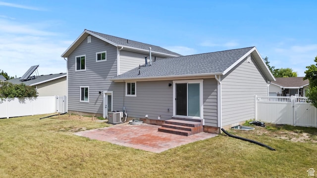 332 E 2475 N, North Logan, UT 84341 - back of house with entry steps, a patio, a fenced backyard, a gate, and a shingled roof