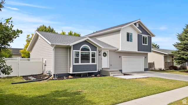 332 E 2475 N, North Logan, UT 84341 - split level home with a garage and driveway
