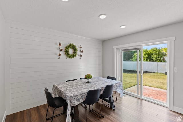 332 E 2475 N, North Logan, UT 84341 - dining space featuring wood finished floors, wood walls, and recessed lighting