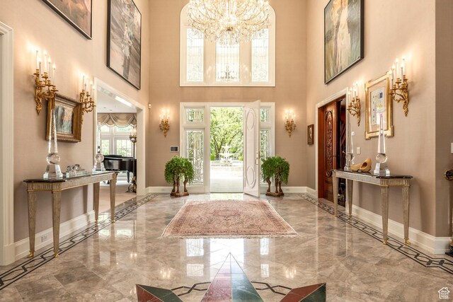 1384 N 450 E, Orem, UT 84097 - entrance foyer with marble tiled flooring, a chandelier, and a towering ceiling