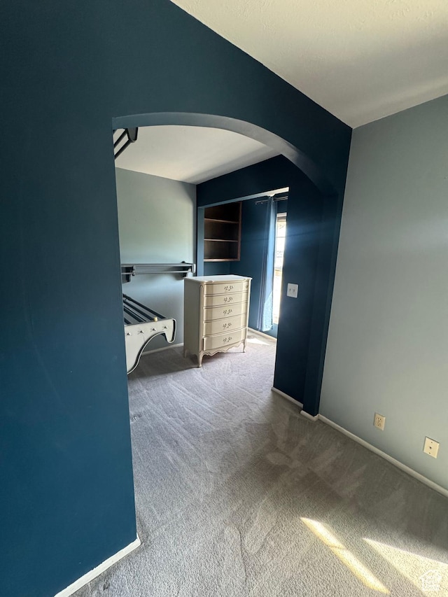 2650 E Willow Wick Dr, Sandy, UT 84093 - unfurnished bedroom with arched walkways and carpet