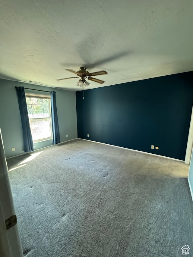 2650 E Willow Wick Dr, Sandy, UT 84093 - carpeted empty room with a ceiling fan and a textured ceiling