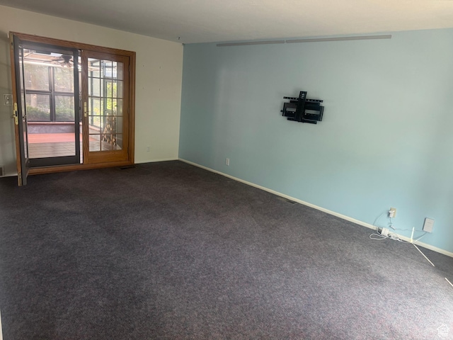 2650 E Willow Wick Dr, Sandy, UT 84093 - spare room featuring dark colored carpet
