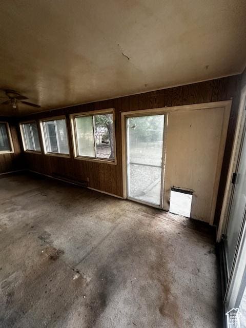 3700 S 3325 W, West Valley City, UT 84119 - unfurnished room featuring wooden walls and a ceiling fan
