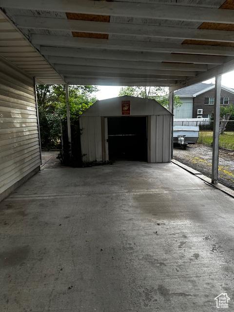 3700 S 3325 W, West Valley City, UT 84119 - view of parking / parking lot featuring a shed
