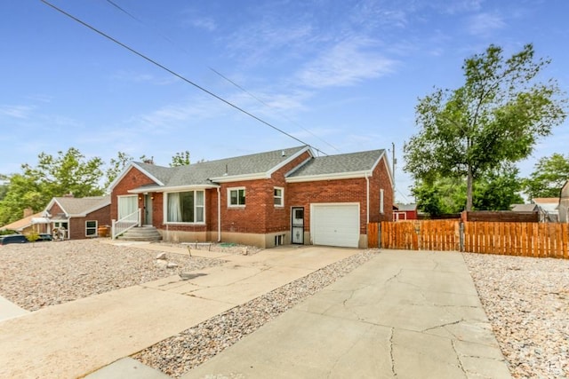 3071 Quincy Ave, Ogden, UT 84403 - view of front of house with a garage, brick siding, concrete driveway, a shingled roof, and a chimney