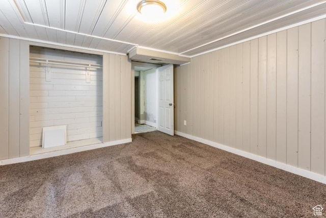 3071 Quincy Ave, Ogden, UT 84403 - unfurnished bedroom featuring carpet flooring, wood walls, and wood ceiling