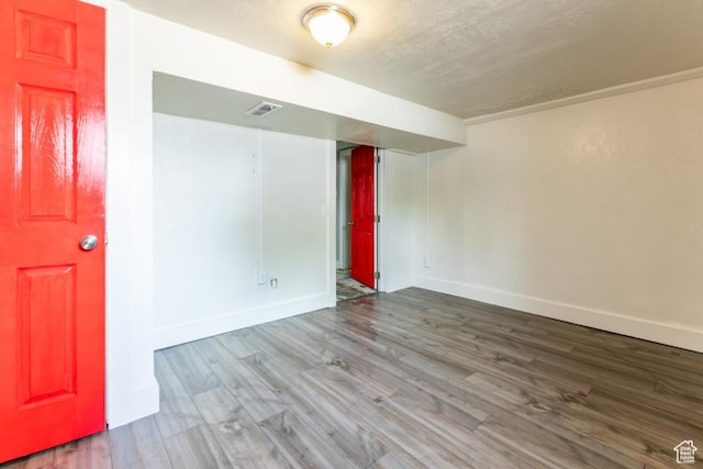 3071 Quincy Ave, Ogden, UT 84403 - spare room with wood finished floors and a textured ceiling