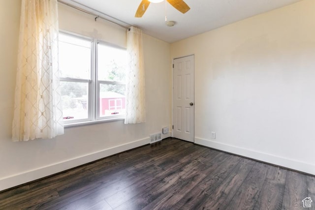 3071 Quincy Ave, Ogden, UT 84403 - empty room featuring dark wood-style floors, a ceiling fan, and a smoke detector