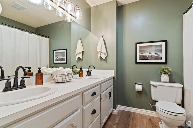 5791 S Oakwood Dr W, South Ogden, UT 84405 - full bath with double vanity and wood finished floors