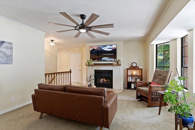 5791 S Oakwood Dr W, South Ogden, UT 84405 - living area with light colored carpet, ceiling fan, a brick fireplace, crown molding, and a textured ceiling