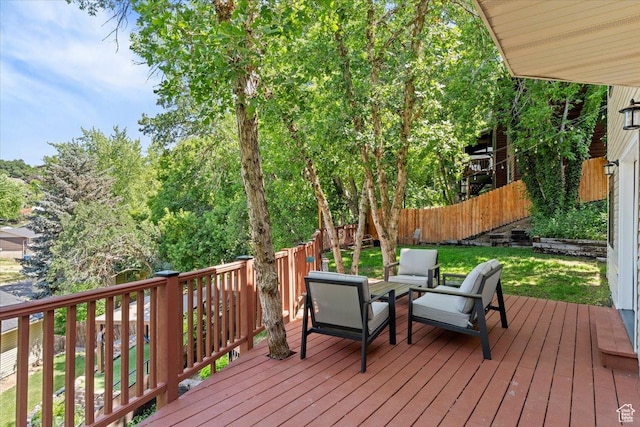 5791 S Oakwood Dr W, South Ogden, UT 84405 - wooden deck with a fenced backyard and an outdoor hangout area