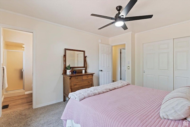 5791 S Oakwood Dr W, South Ogden, UT 84405 - bedroom with ornamental molding, a closet, light carpet, ceiling fan, and connected bathroom