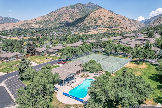 3683 E Cove Point Dr, Millcreek, UT 84109 - aerial view of a mountain backdrop and a pool