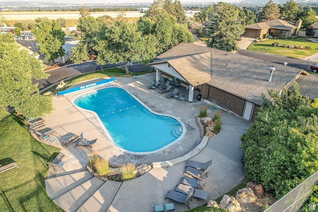 3683 E Cove Point Dr, Millcreek, UT 84109 - view of swimming pool featuring a patio area