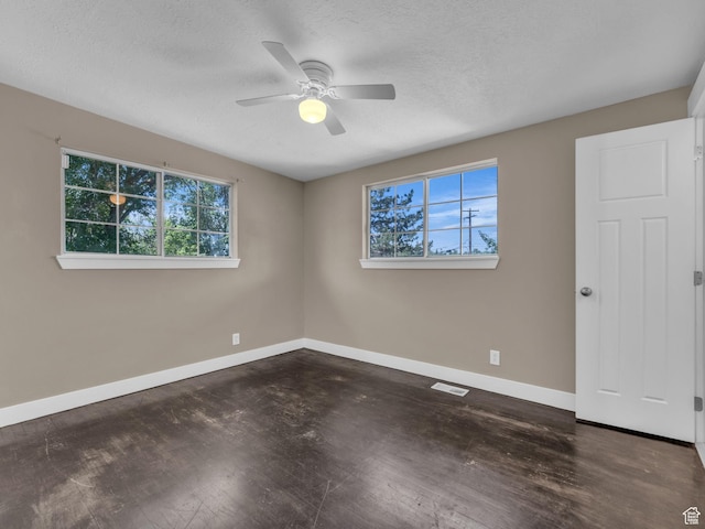 787 E Casa Blanco Cir, Midvale, UT 84047 - empty room featuring healthy amount of natural light, wood finished floors, ceiling fan, and a textured ceiling