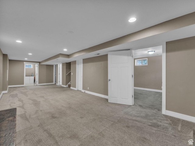 787 E Casa Blanco Cir, Midvale, UT 84047 - below grade area with light carpet, recessed lighting, and stairs
