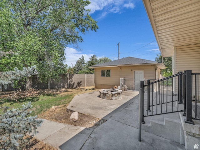 787 E Casa Blanco Cir, Midvale, UT 84047 - view of patio with an outdoor fire pit
