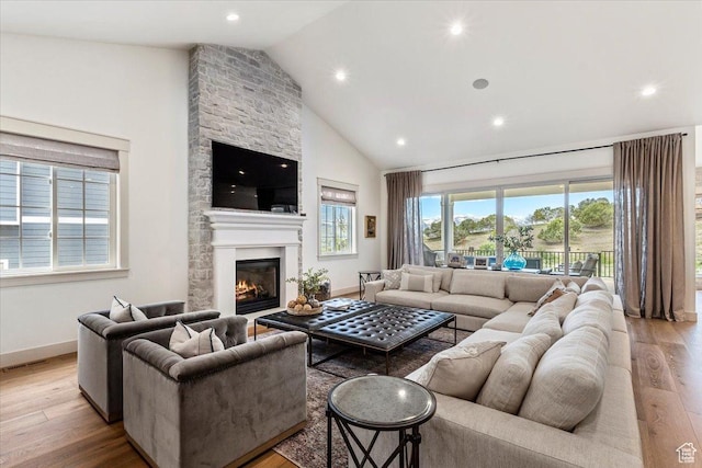 1023 W Lime Canyon Rd, Midway, UT 84049 - living room featuring light wood-style floors, high vaulted ceiling, a fireplace, and recessed lighting