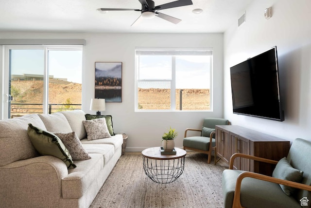 875 W Akoya Pearl St Unit 205, St George, UT 84790 - living room with ceiling fan and baseboards