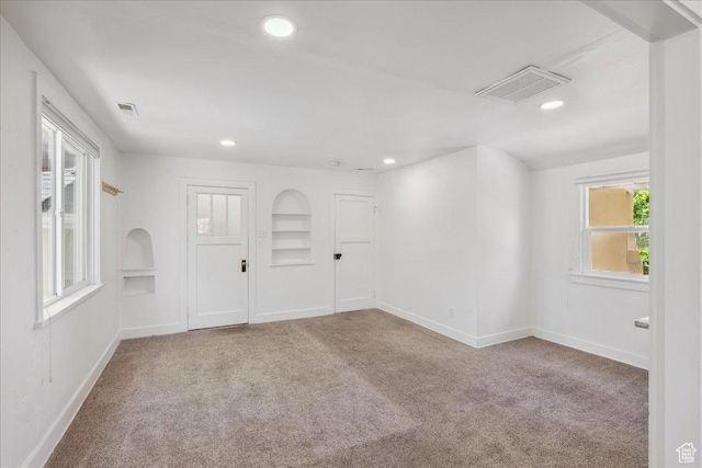 537 N Darwin St W, Salt Lake City, UT 84103 - spare room featuring carpet flooring, recessed lighting, and built in features
