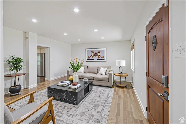 537 N Darwin St W, Salt Lake City, UT 84103 - living room featuring light wood-type flooring and recessed lighting