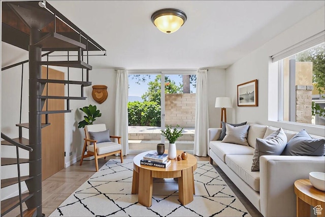 537 N Darwin St W, Salt Lake City, UT 84103 - living area featuring stairway and baseboards