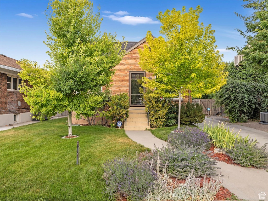 1117 S 400 E, Salt Lake City, UT 84111 - view of property hidden behind natural elements featuring brick siding