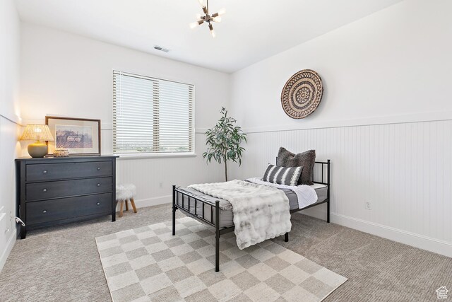 1471 S Sage Bloom Way, Saratoga Springs, UT 84045 - bedroom with a chandelier, carpet, and a wainscoted wall