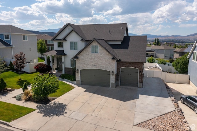 1471 S Sage Bloom Way, Saratoga Springs, UT 84045 - view of front of property with roof with shingles, a mountain view, driveway, and an attached garage
