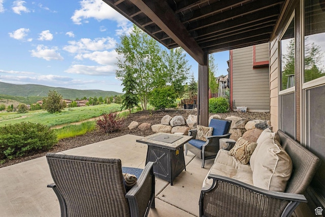 1046 W Abigail Dr, Heber City, UT 84032 - view of patio featuring a mountain view and an outdoor living space