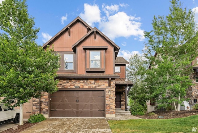 1046 W Abigail Dr, Heber City, UT 84032 - craftsman-style home featuring stone siding, an attached garage, driveway, and a front yard