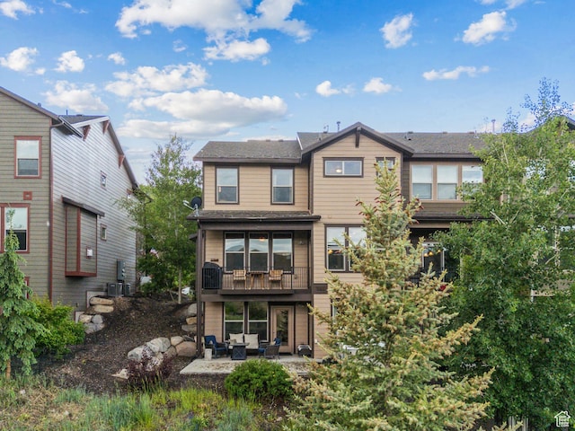 1046 W Abigail Dr, Heber City, UT 84032 - rear view of house with a patio, a balcony, and an outdoor hangout area