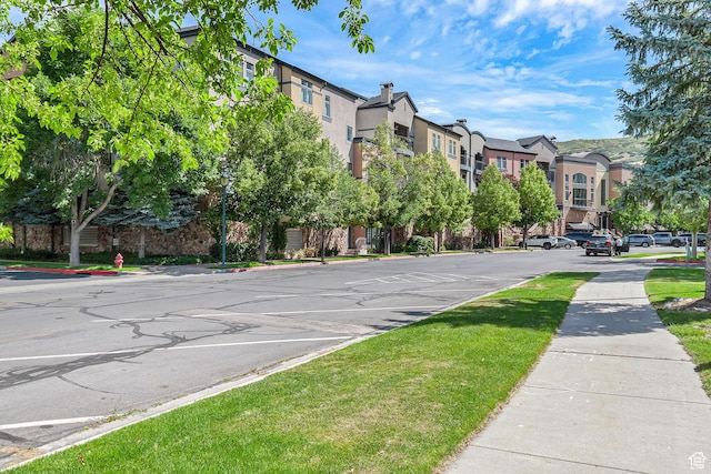 5005 N Edgewood Dr W Unit 301, Provo, UT 84604 - view of asphalt road featuring sidewalks, curbs, and a residential view