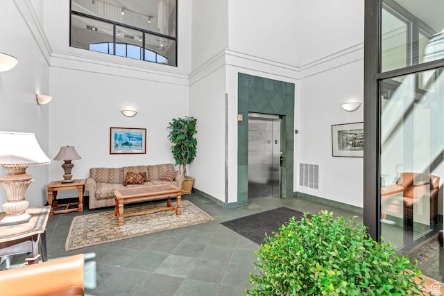 5005 N Edgewood Dr W Unit 301, Provo, UT 84604 - building lobby featuring a high ceiling