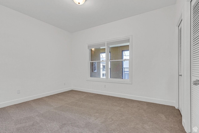 5005 N Edgewood Dr W Unit 301, Provo, UT 84604 - unfurnished bedroom featuring carpet floors and a closet