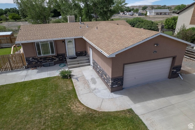 685 W 2550 S, Price, UT 84501 - ranch-style home with stone siding, stucco siding, roof with shingles, and an attached garage