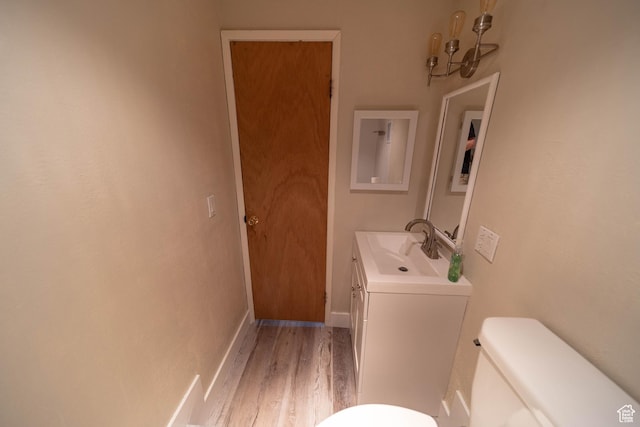 685 W 2550 S, Price, UT 84501 - bathroom featuring vanity and wood finished floors