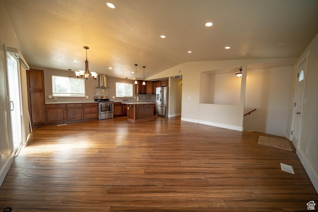 685 W 2550 S, Price, UT 84501 - unfurnished living room with vaulted ceiling, a chandelier, dark wood-style floors, and recessed lighting