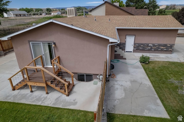 685 W 2550 S, Price, UT 84501 - back of house featuring stucco siding, a shingled roof, and entry steps