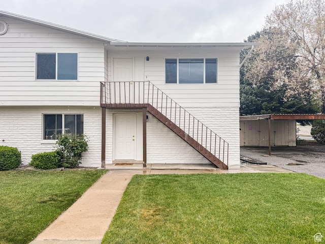1464 S 50 E, Orem, UT 84058 - view of front property featuring a front yard and brick siding