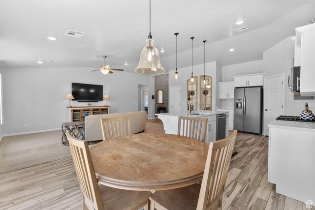 902 E 3950 S, Washington, UT 84780 - dining room featuring lofted ceiling, ceiling fan, light wood finished floors, and recessed lighting