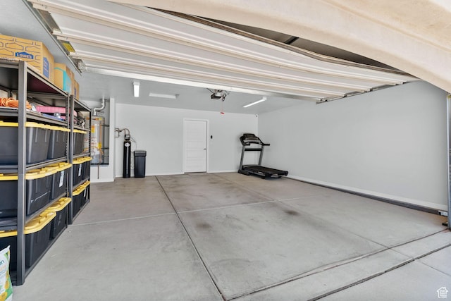 902 E 3950 S, Washington, UT 84780 - garage featuring water heater and a garage door opener